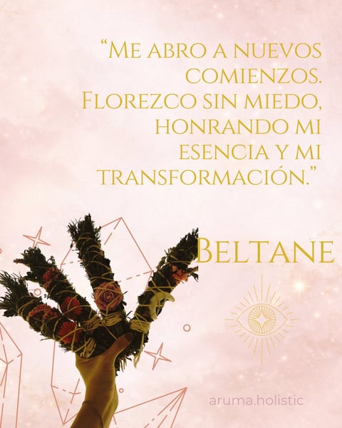 A hand holding a bundle of dried herbs with gold Spanish text and geometric symbols on a soft pink background, credited to Beltane